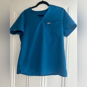 Figs blue scrub top in M.